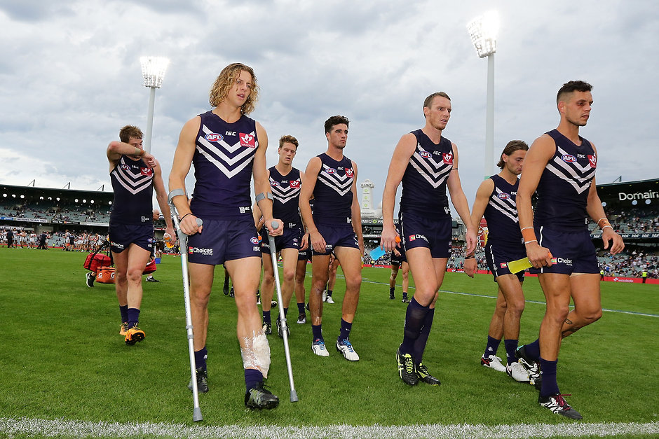 AFL 2016 Rd 05 - Fremantle v Carlton PERTH, AUSTRALIA - APRIL 24: Nathan Fyfe of the Dockers leave the field on crutches after the teams defeat during the 2016 AFL Round 05 match between the Fremantle Dockers and the Carlton Blues at Domain Stadium, Perth on April 24, 2016. (Photo by Will Russell/AFL Media)
